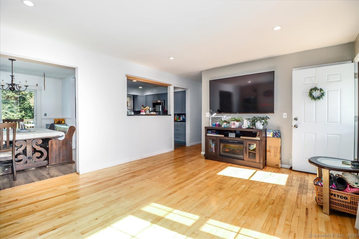 35 Hillendale Drive New Milford, CT 06776 - Photo 9 of 39 a living room with furniture and a flat screen tv