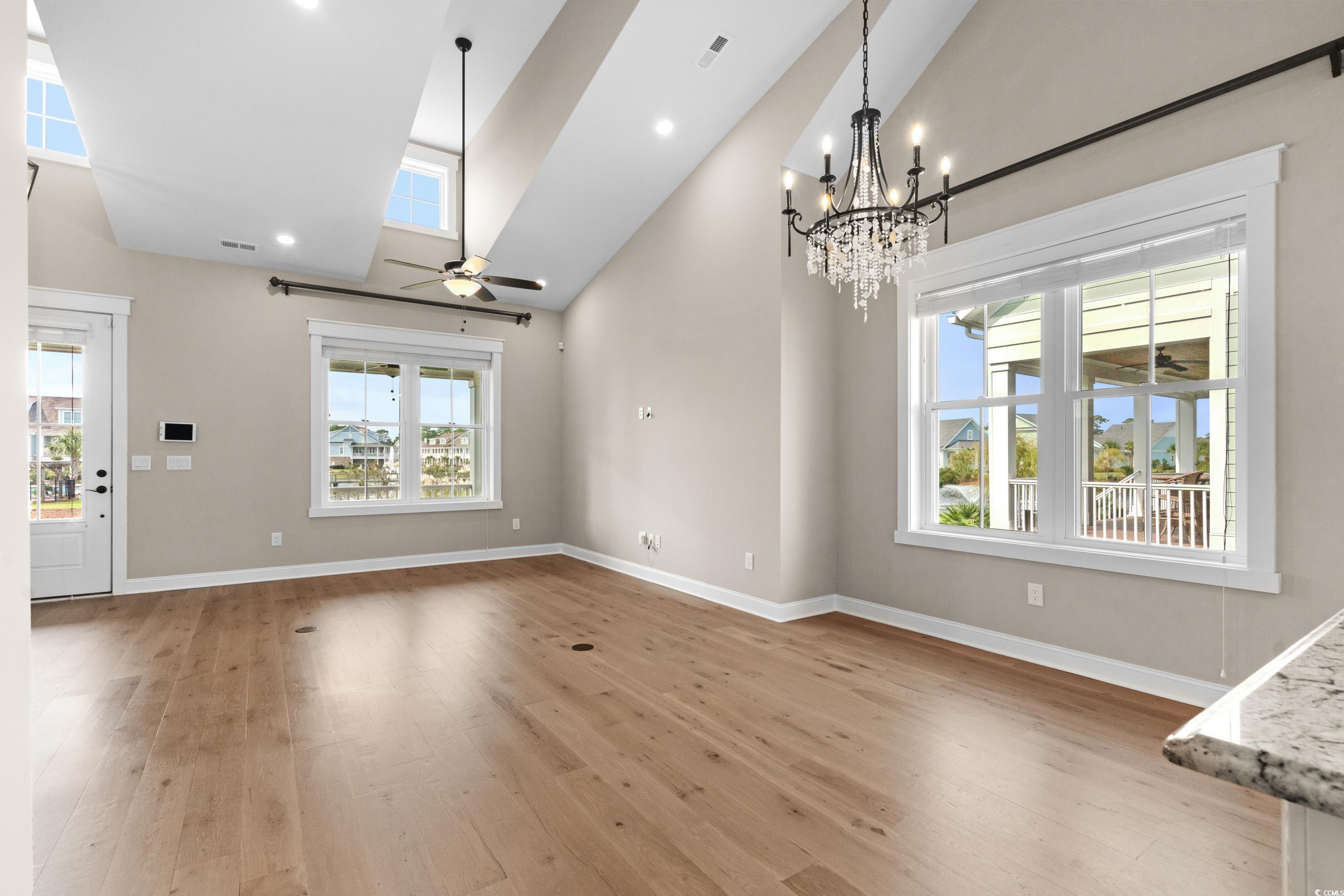 8159 Sandlapper Way Myrtle Beach, SC 29572 - Photo 12 of 39 Unfurnished dining area featuring ceiling fan with