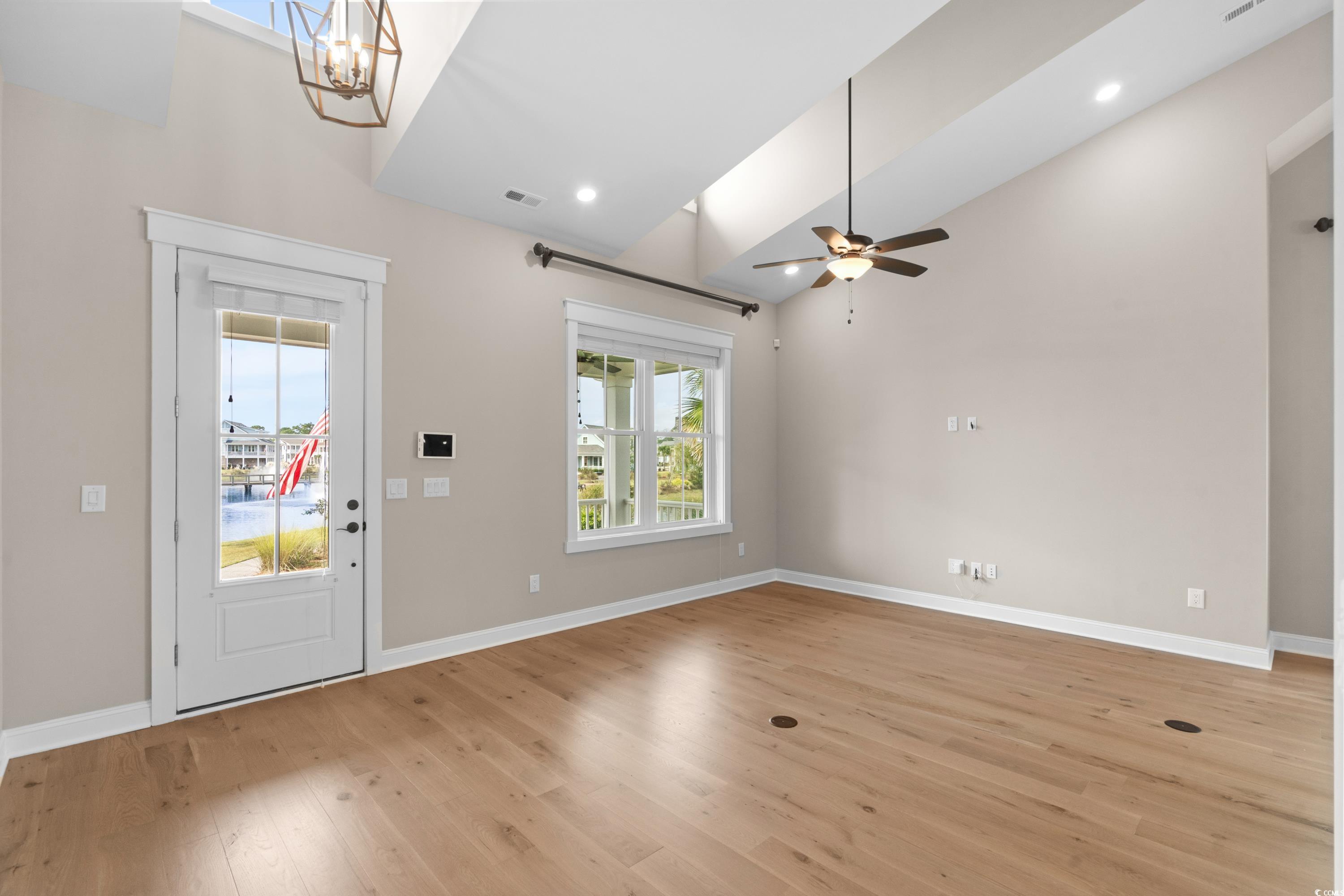 8159 Sandlapper Way Myrtle Beach, SC 29572 - Photo 13 of 39 Entrance foyer with ceiling fan with notable chand