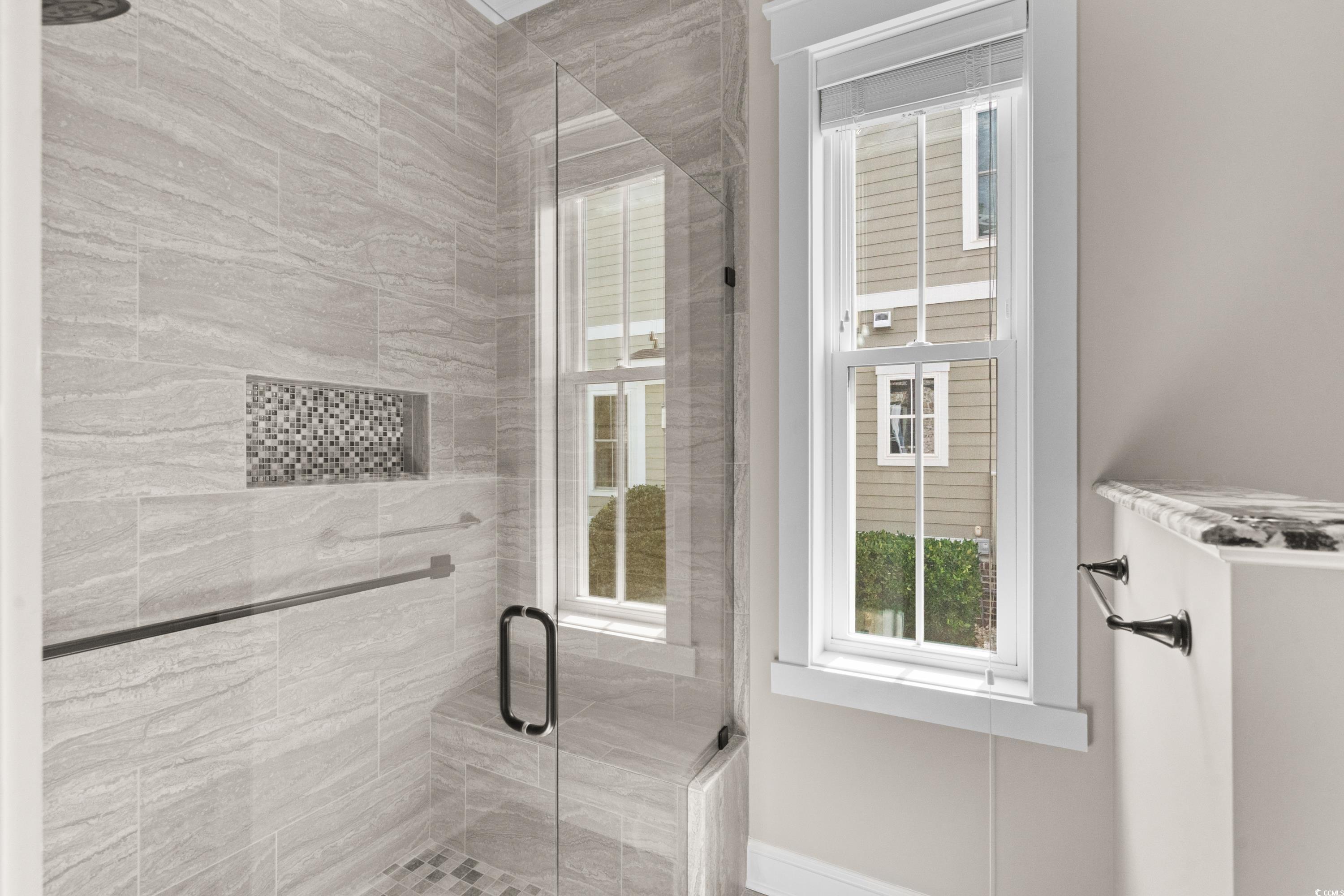 8159 Sandlapper Way Myrtle Beach, SC 29572 - Photo 28 of 39 Bathroom featuring an enclosed shower