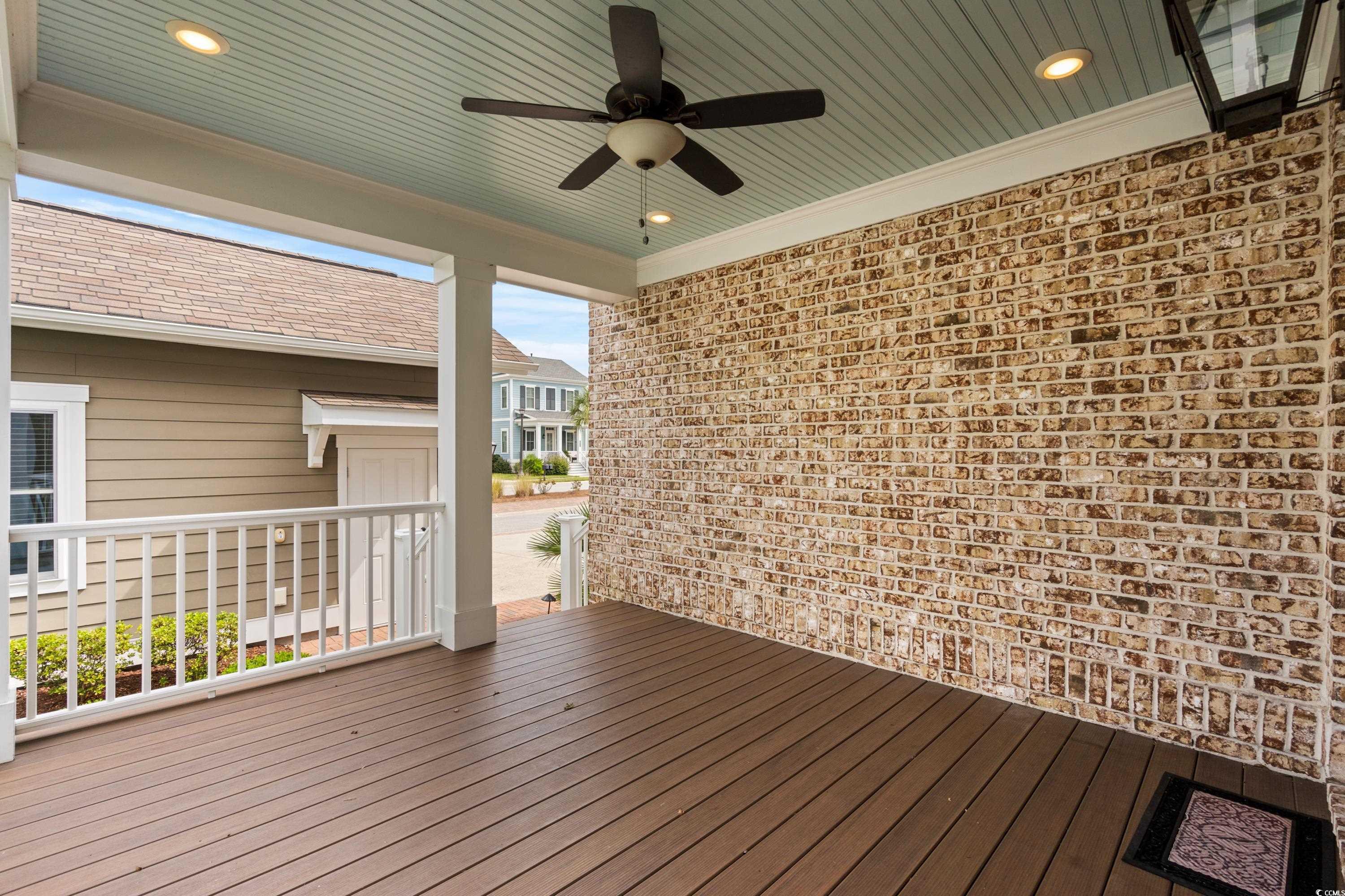 8159 Sandlapper Way Myrtle Beach, SC 29572 - Photo 8 of 39 Wooden terrace with ceiling fan