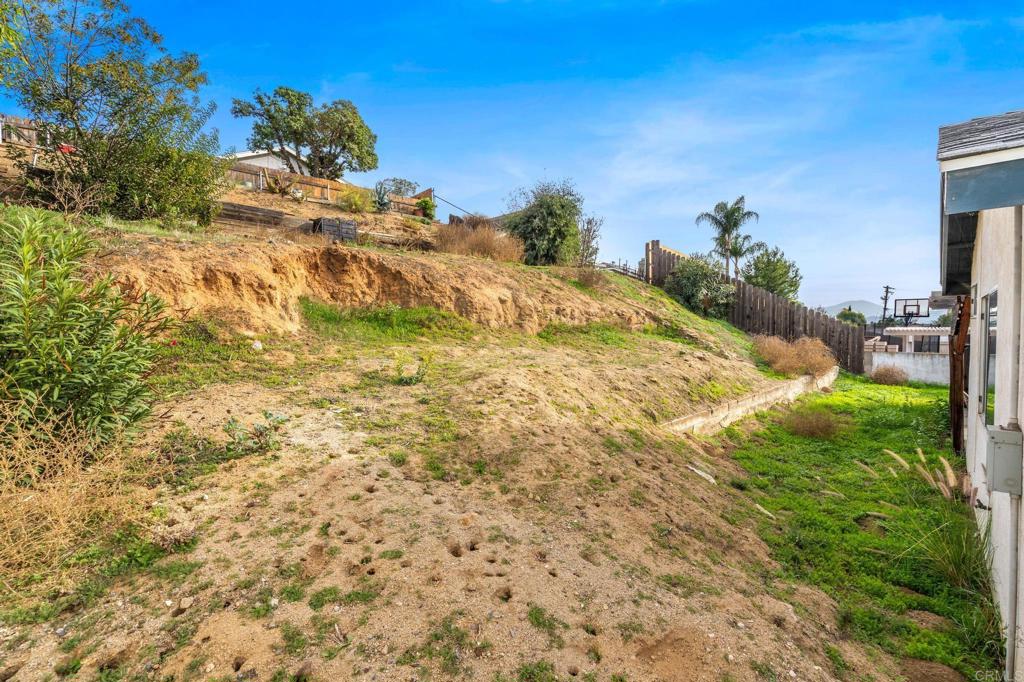 8321 Sheila Street El Cajon, CA 92021 - Photo 25 of 26 a view of a yard with an outdoor space