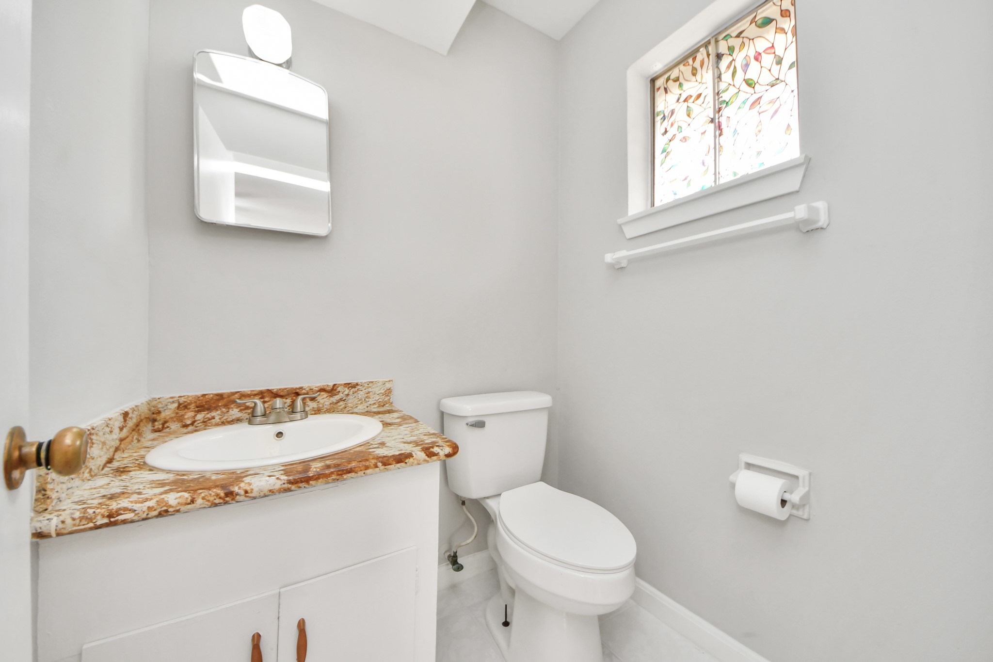 1923 Springrock Lane Houston, TX 77080 - Photo 27 of 46 Half bath attached to primary bedroom.