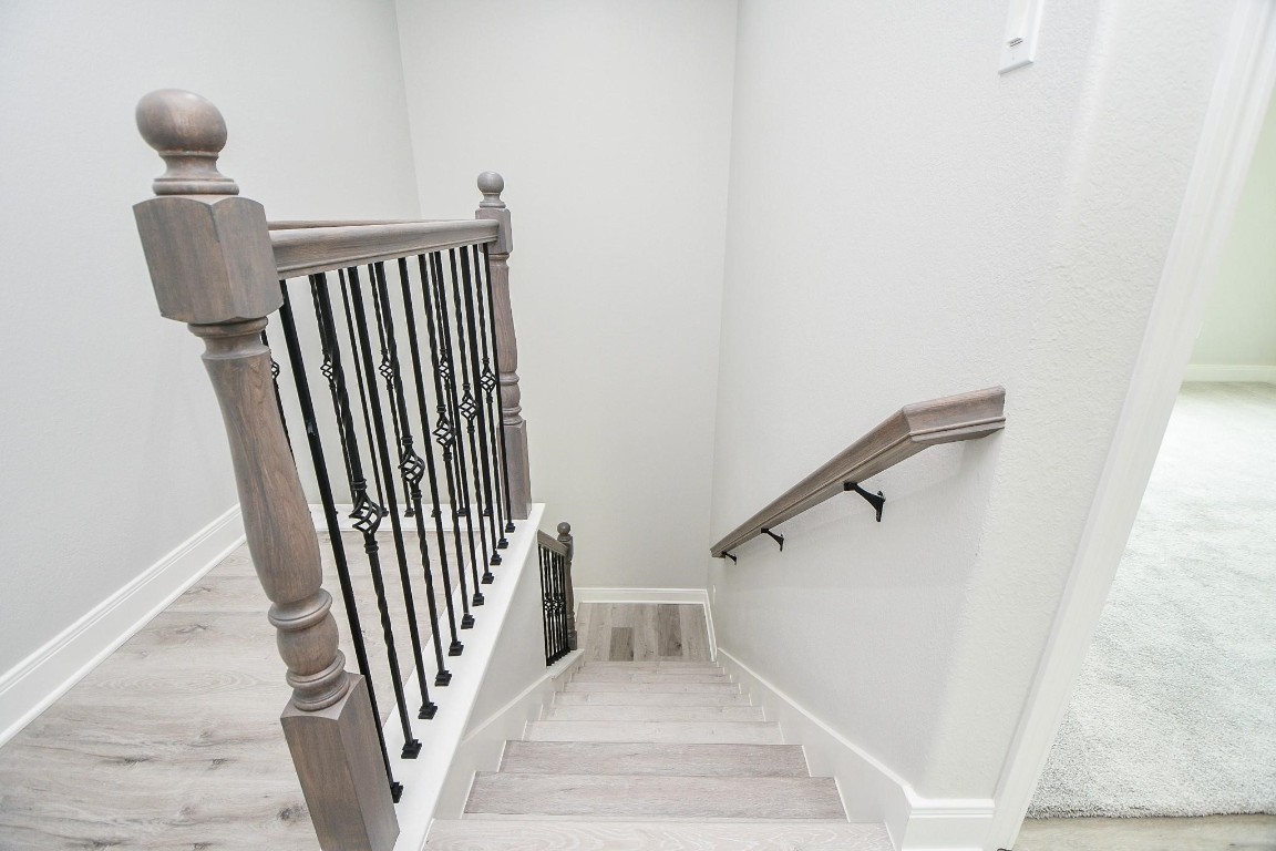 8336 Fountain Street Houston, TX 77051 - Photo 16 of 34 an entryway in a hall with wooden floor