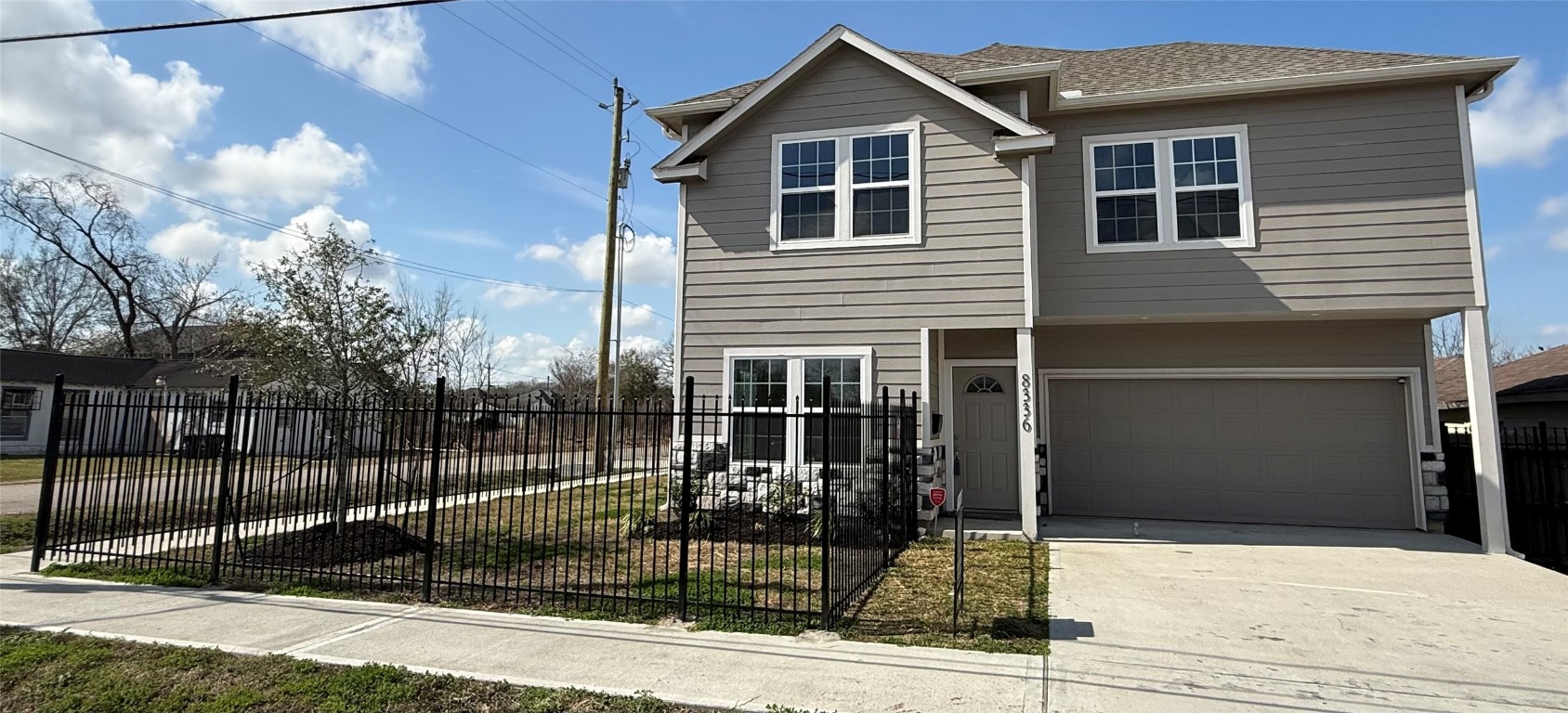 8336 Fountain Street Houston, TX 77051 - Photo 2 of 34 a front view of a house with garage