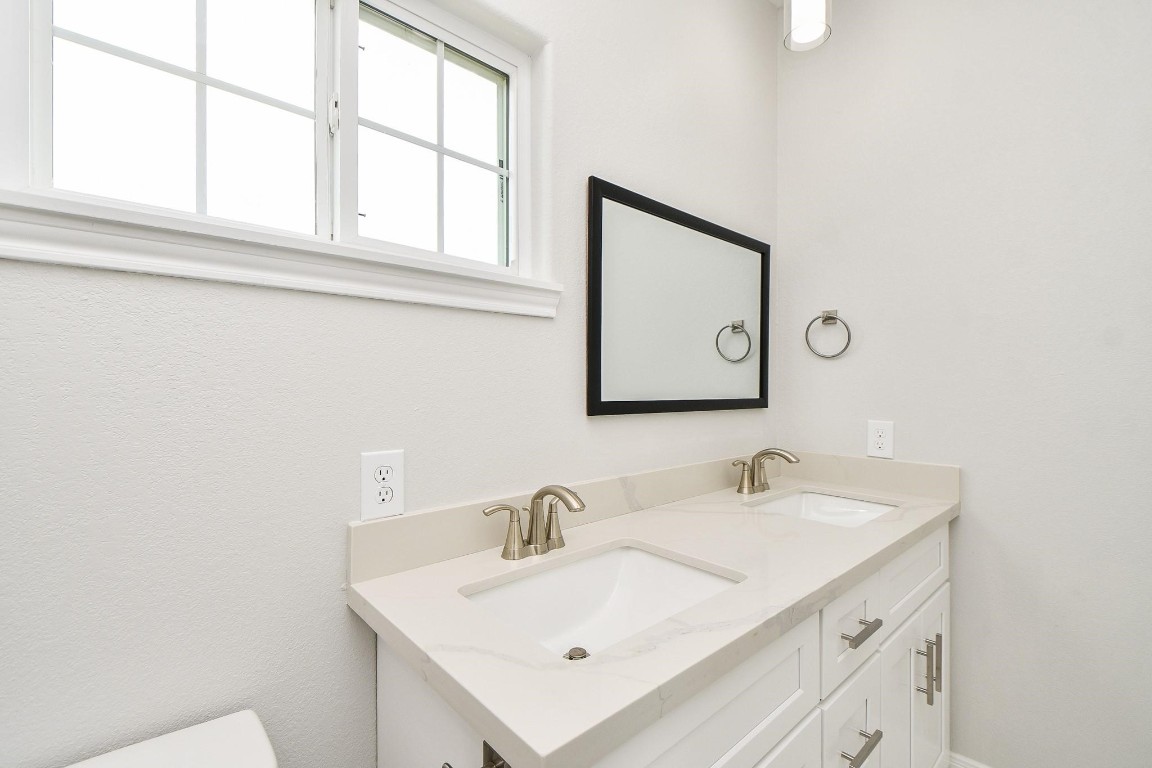 8336 Fountain Street Houston, TX 77051 - Photo 21 of 34 a bathroom with a sink and a vanity