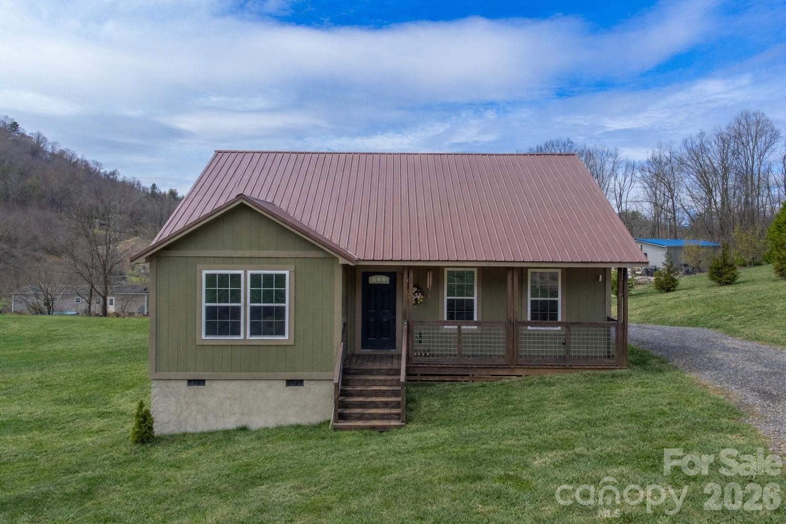 front view of a house with a yard