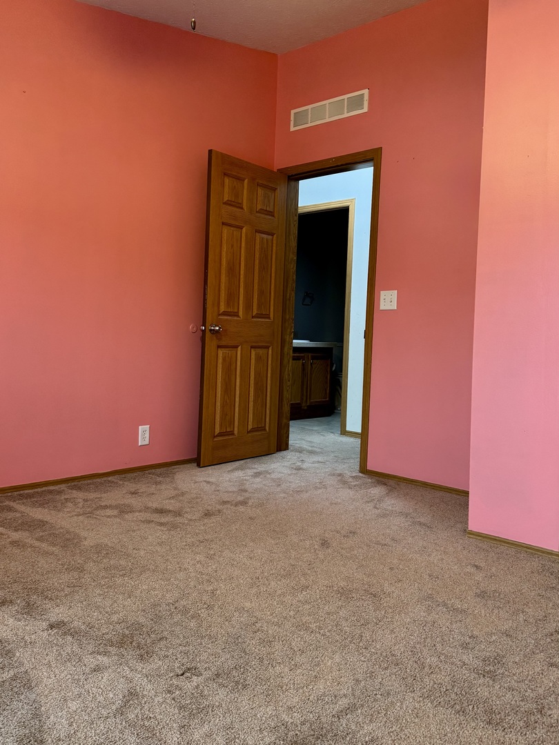 400 James Road Elwood, IL 60421 - Photo 21 of 25 a view of an empty room and fire place