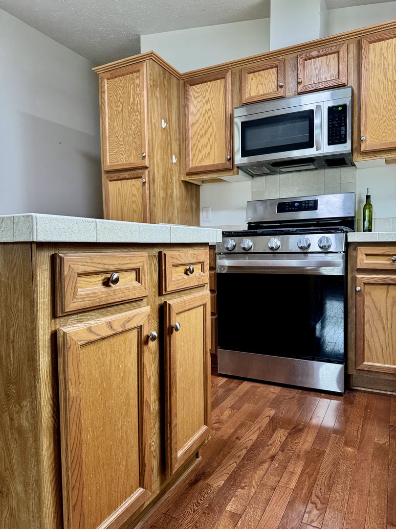 400 James Road Elwood, IL 60421 - Photo 4 of 25 a kitchen with a stove and a microwave