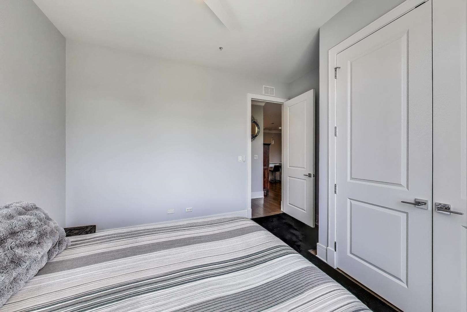 5748 North Hermitage Avenue, Unit 206 Chicago, IL 60660 - Photo 16 of 19 a view of wooden floor