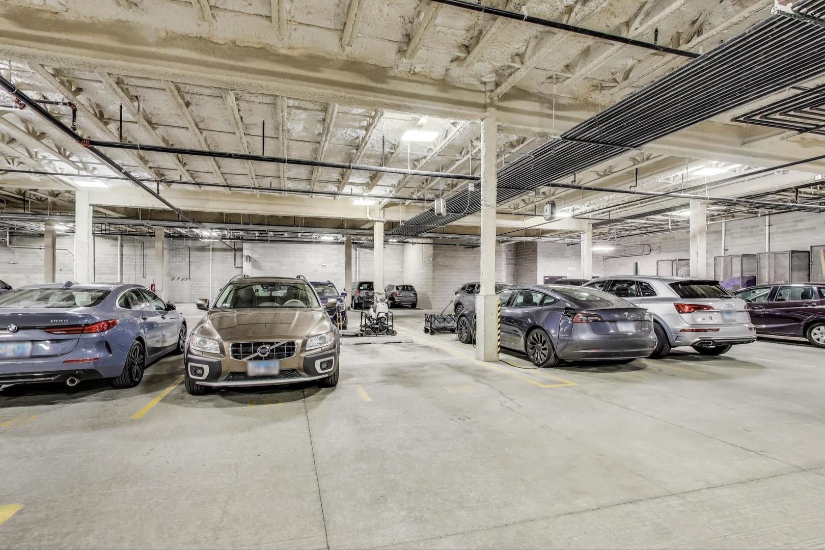 5748 North Hermitage Avenue, Unit 206 Chicago, IL 60660 - Photo 19 of 19 a view of cars parked in a parking