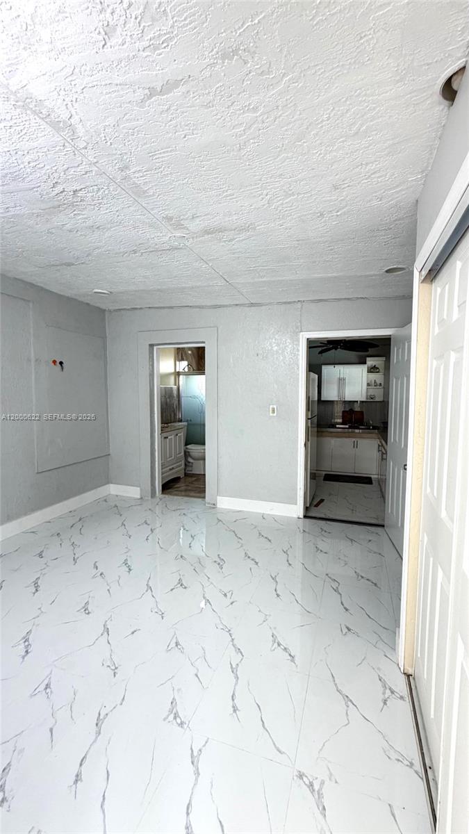 14861 Southwest 173rd Street Miami, FL 33187 - Photo 19 of 24 a view of an empty room