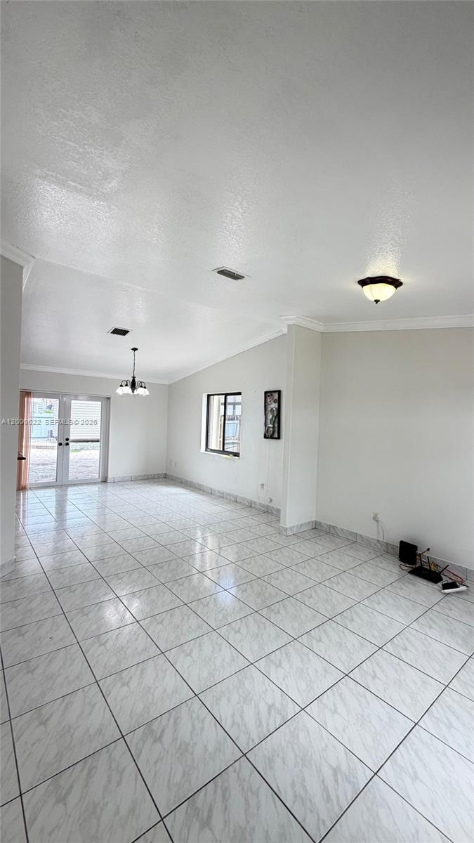 14861 Southwest 173rd Street Miami, FL 33187 - Photo 3 of 24 a view of empty room