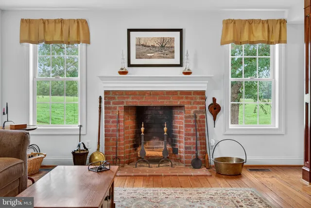 a utility room with mirror dryer and washer