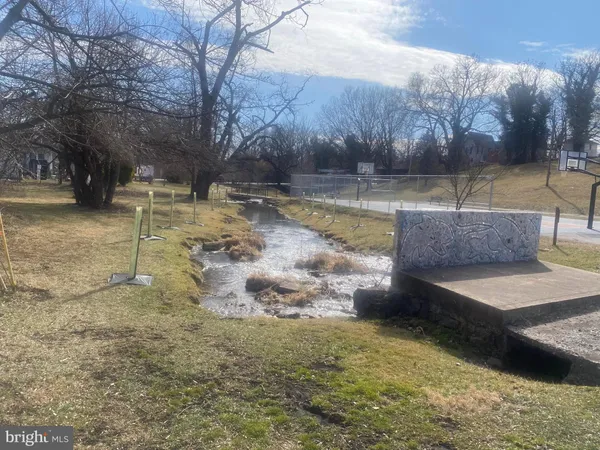 a view of a yard with an outdoor space