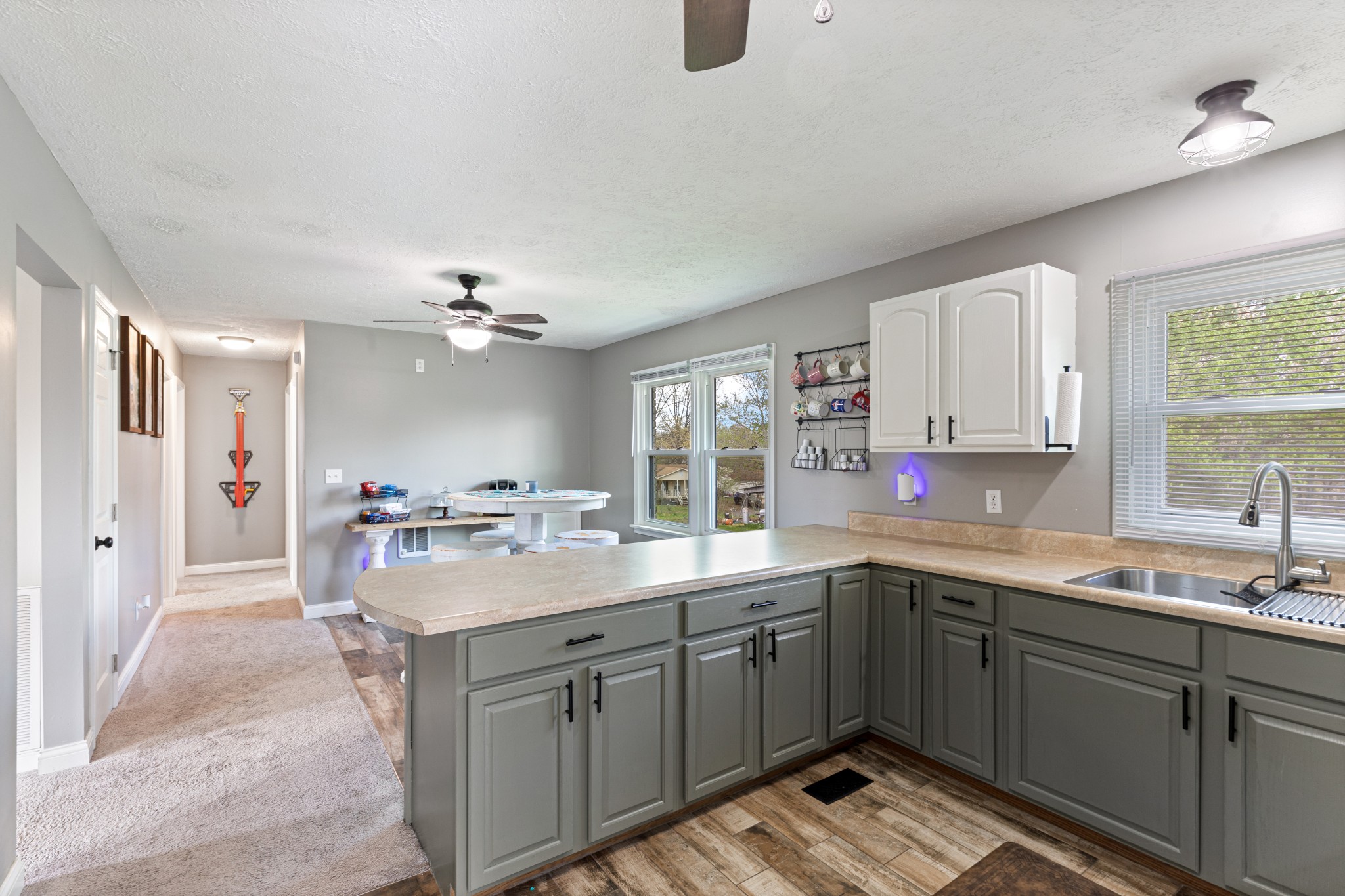 1230 Cooley Ford Road Tennessee Ridge, TN 37178 - Photo 15 of 30 a kitchen with a sink stove and cabinets