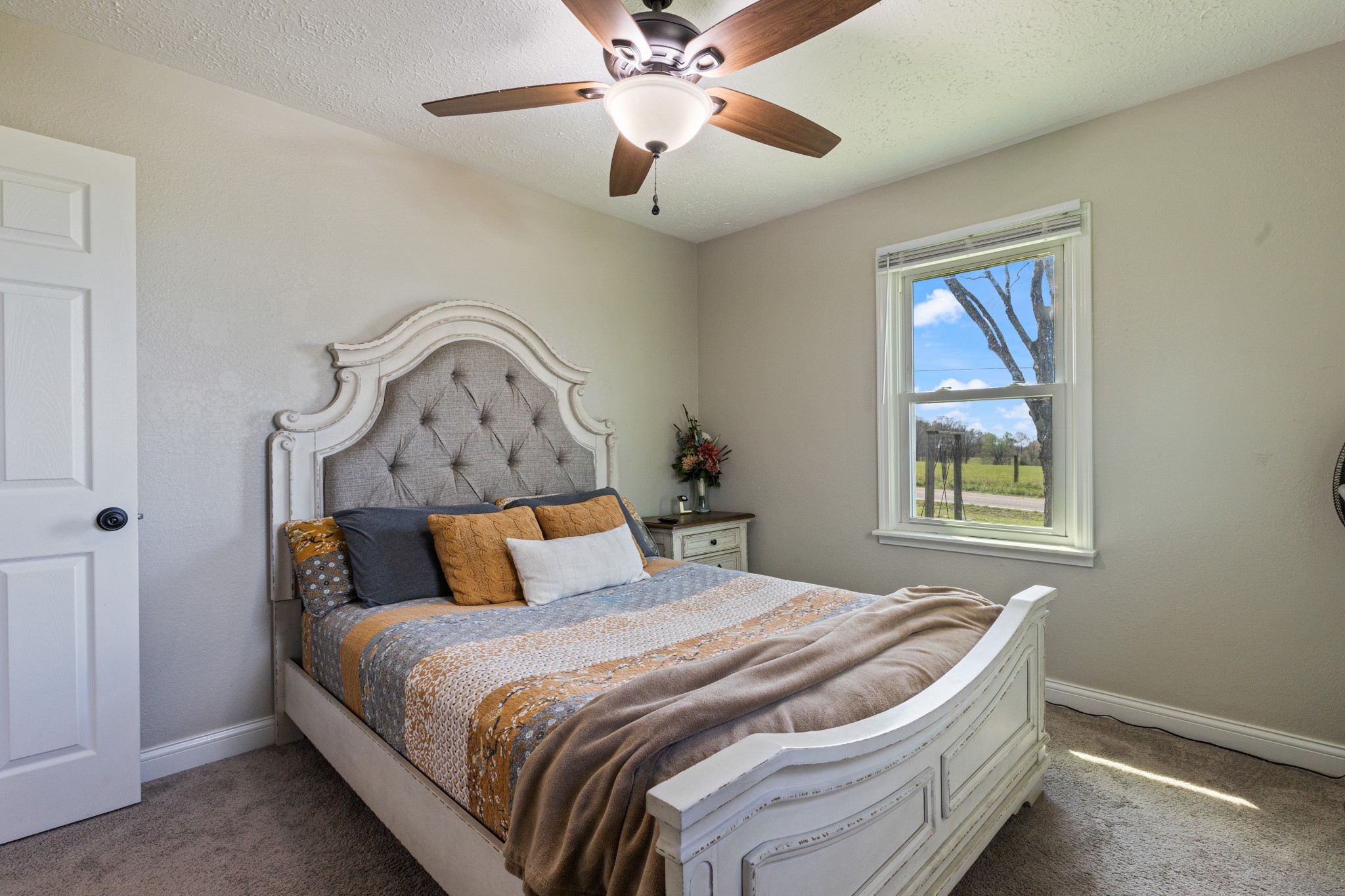 1230 Cooley Ford Road Tennessee Ridge, TN 37178 - Photo 19 of 30 a bedroom with a bed and a window