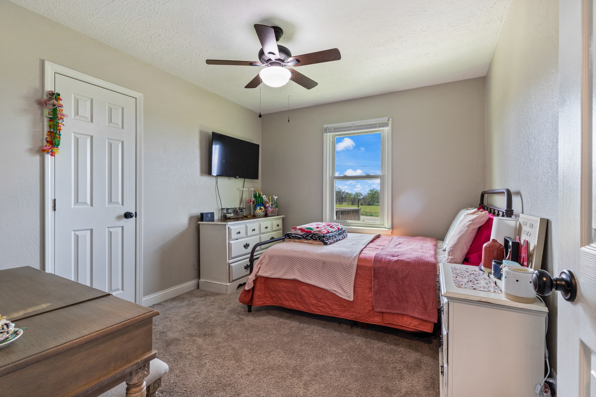 1230 Cooley Ford Road Tennessee Ridge, TN 37178 - Photo 24 of 30 a bedroom with a bed and a tv