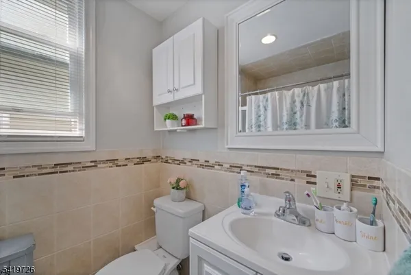 a bathroom with a sink and a toilet