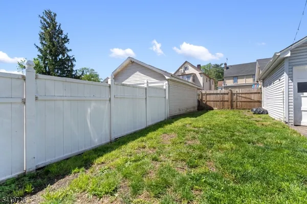 a view of a backyard with a garden