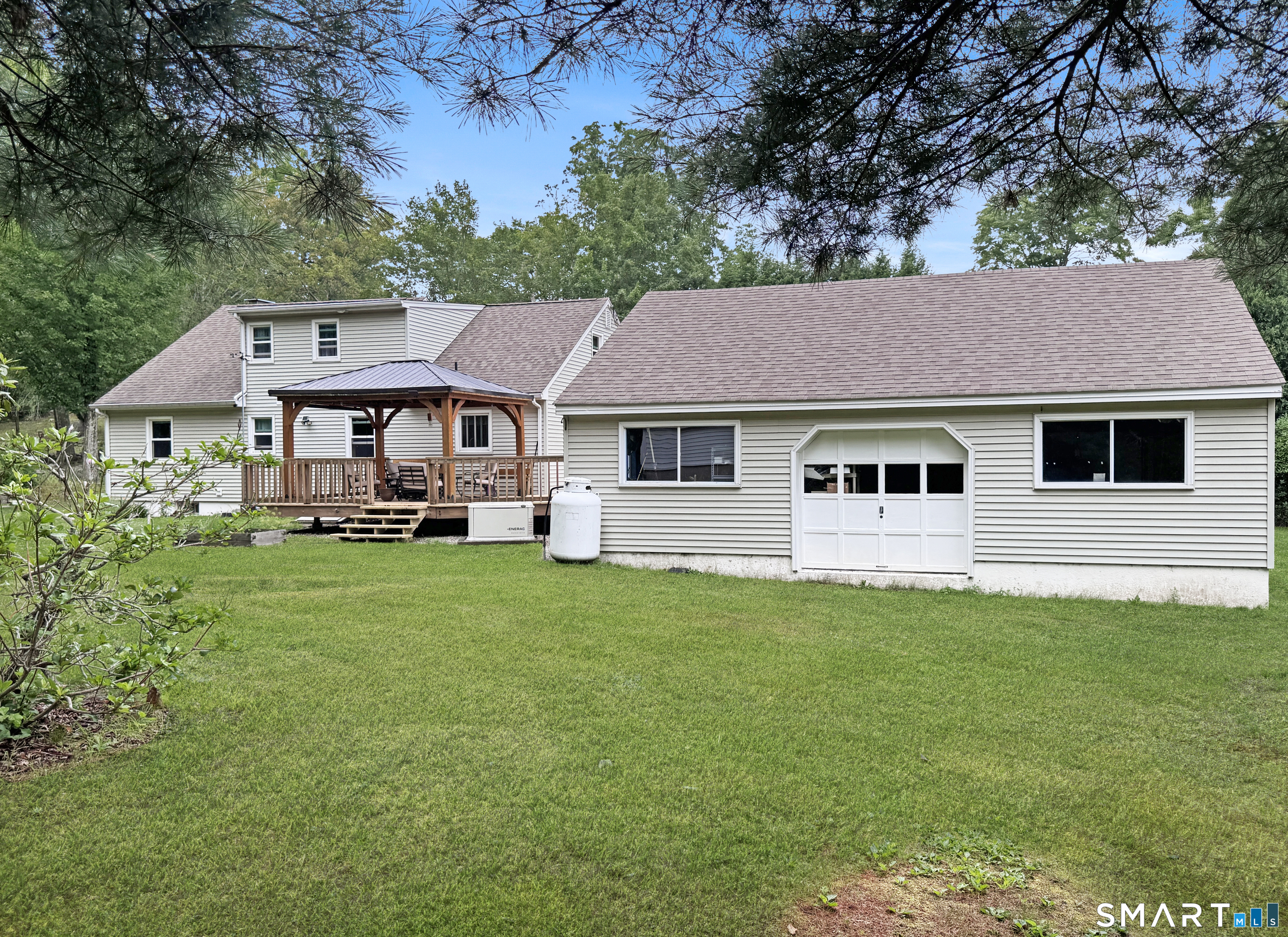95 Stoddards Wharf Road Ledyard, CT 06339 - Photo 2 of 36 Back of 3 Bay Garage has EXTRA Rear Door