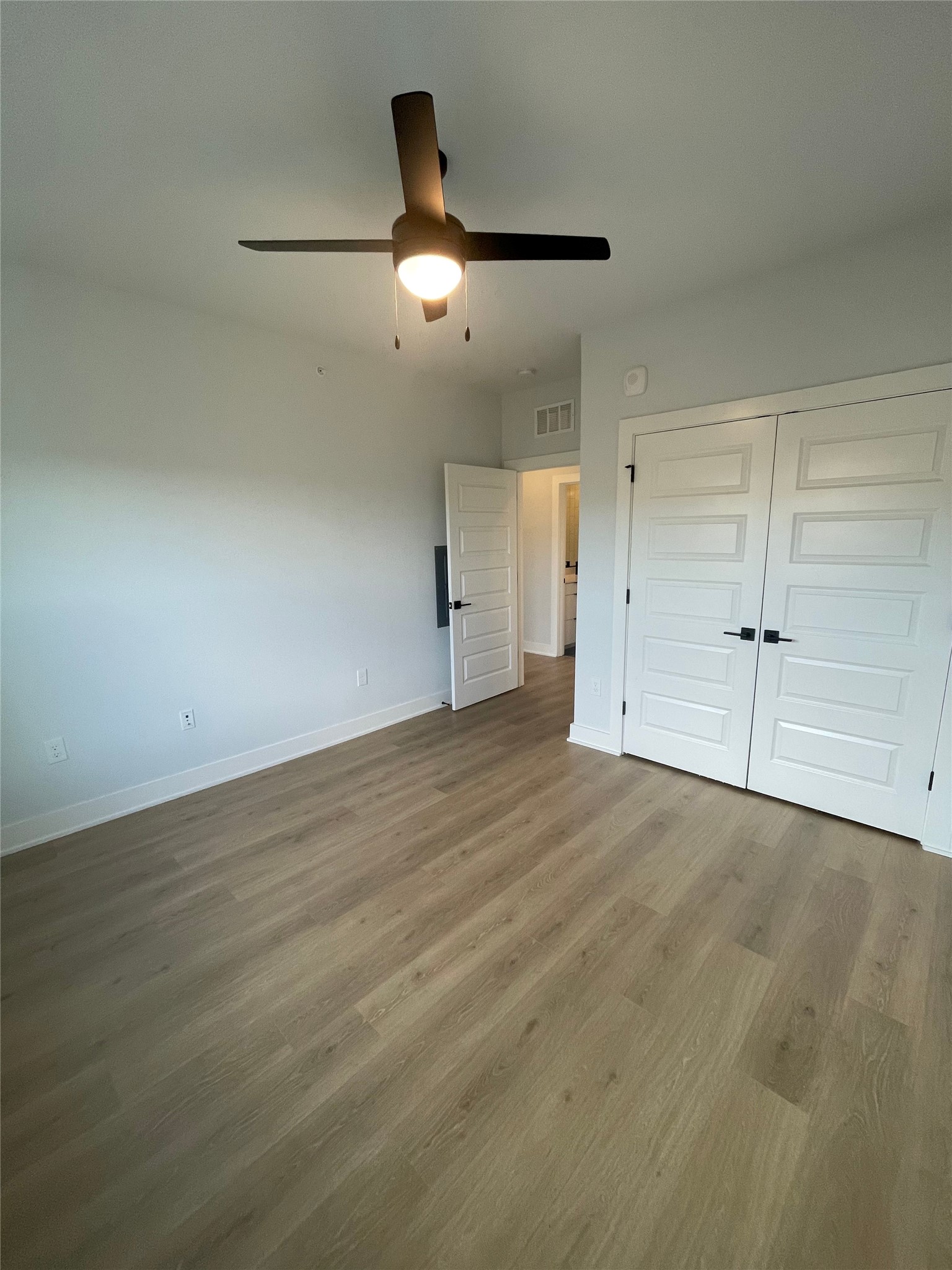 2500 Longview Street, Unit 400 Austin, TX 78705 - Photo 8 of 14 wooden floor in an empty room