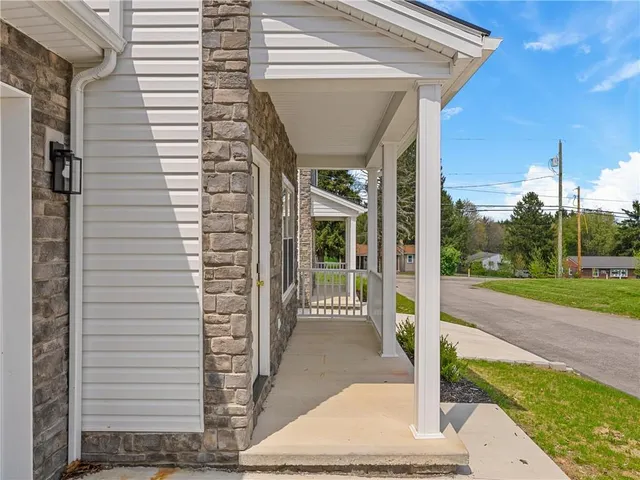 a view of a house with a porch