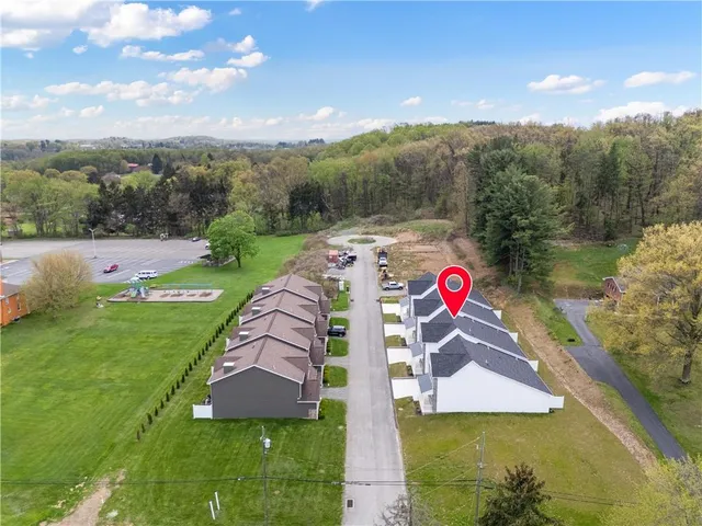 a view of swimming pool with a yard