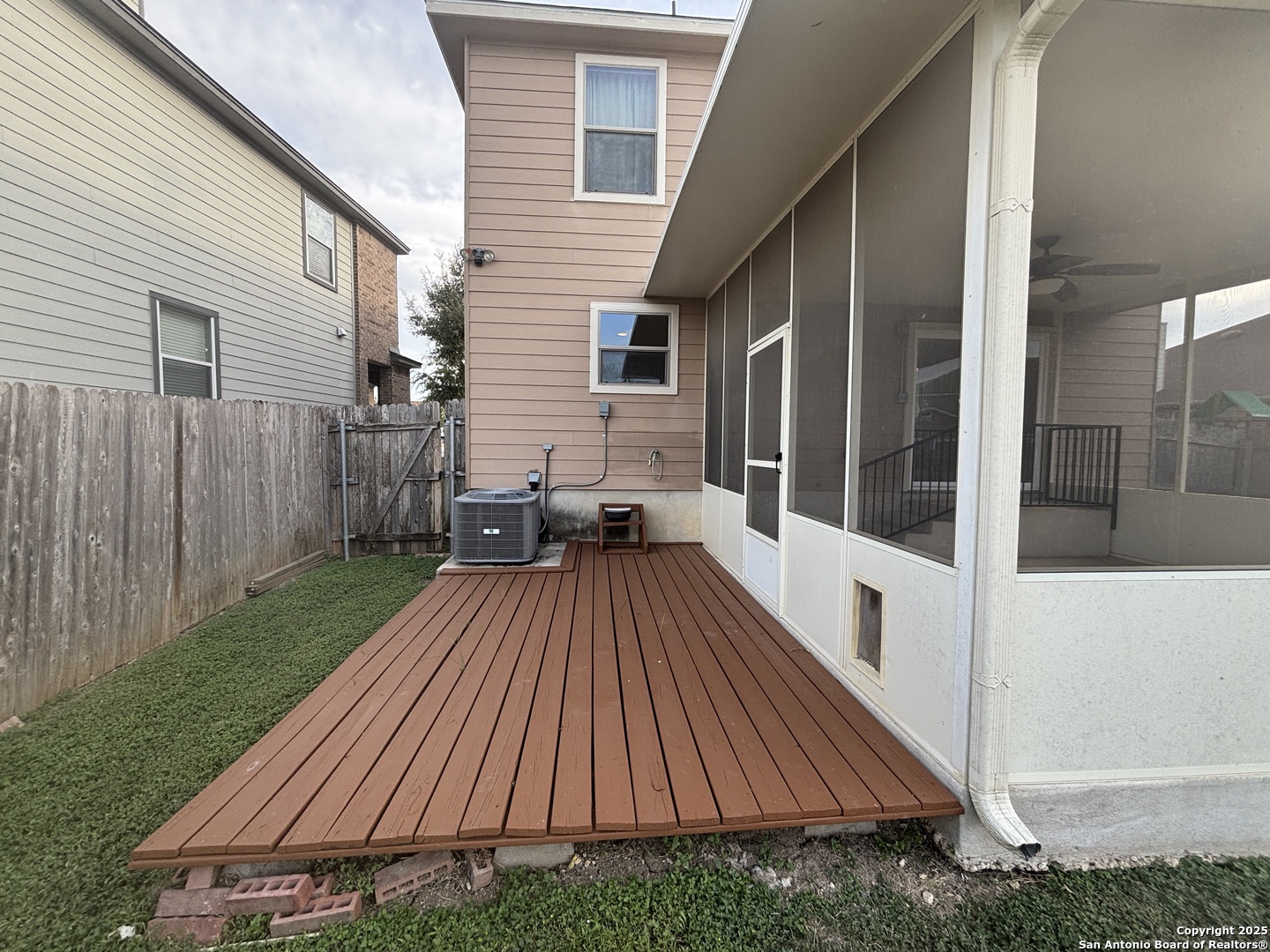 7370 Azalea Square San Antonio, TX 78218 - Photo 12 of 38 a view of backyard with a deck and wooden floor