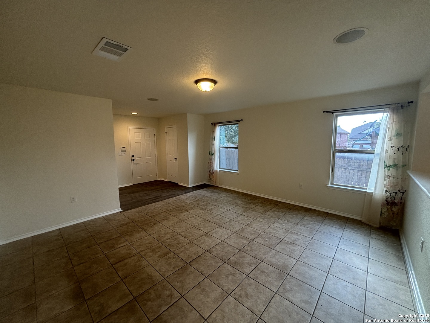 7370 Azalea Square San Antonio, TX 78218 - Photo 14 of 38 an empty room with windows