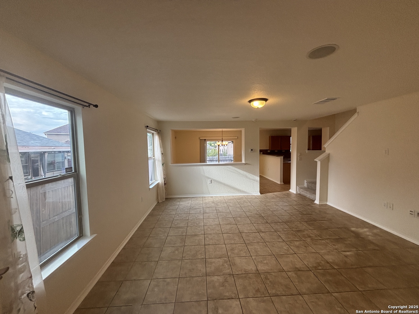 7370 Azalea Square San Antonio, TX 78218 - Photo 16 of 38 a view of empty room with windows