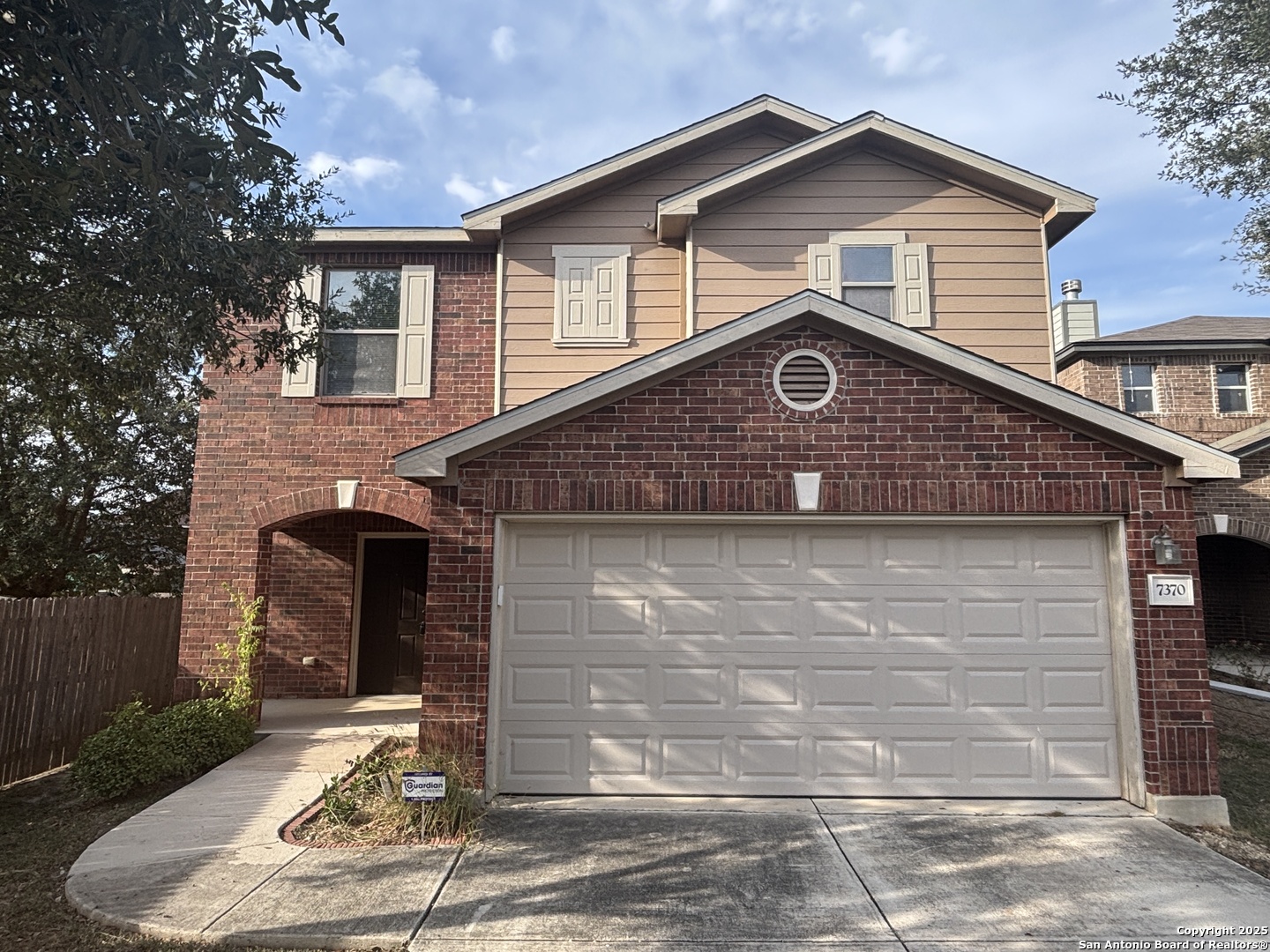 7370 Azalea Square San Antonio, TX 78218 - Photo 2 of 38 a front view of house