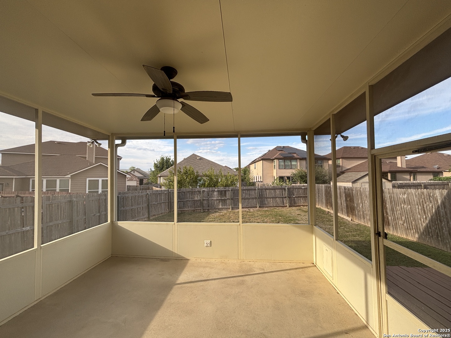 7370 Azalea Square San Antonio, TX 78218 - Photo 3 of 38 a view of empty room with a floor to ceiling window