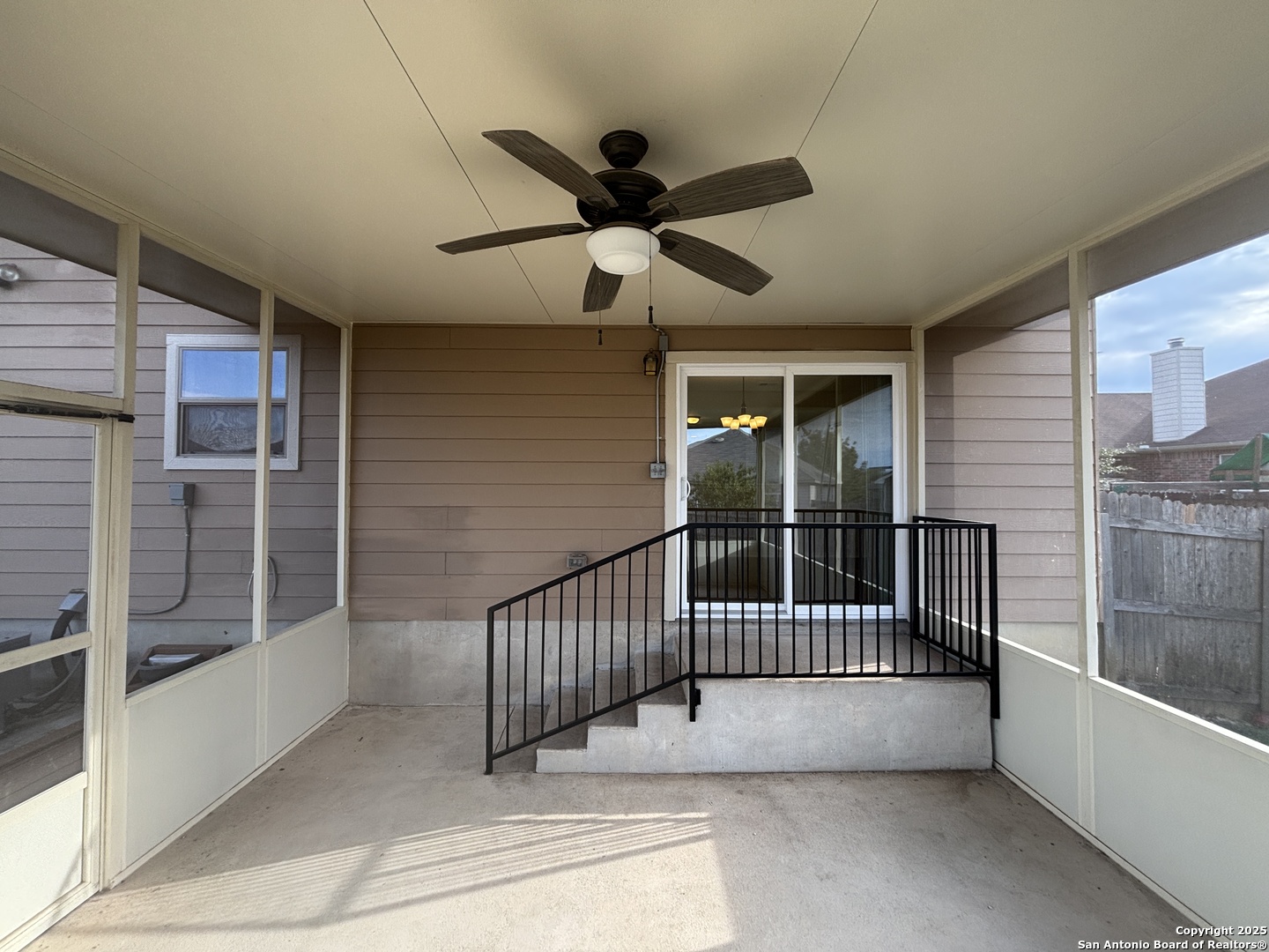 7370 Azalea Square San Antonio, TX 78218 - Photo 4 of 38 a view of a balcony with a ceiling fan