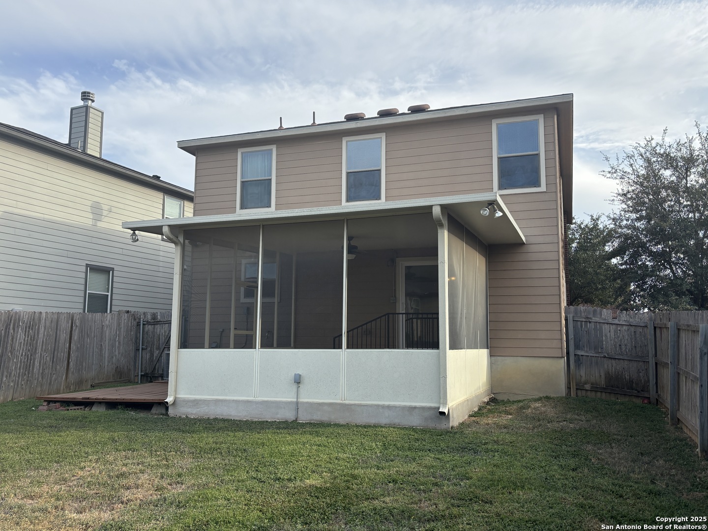 7370 Azalea Square San Antonio, TX 78218 - Photo 10 of 38 a view of a house with a yard