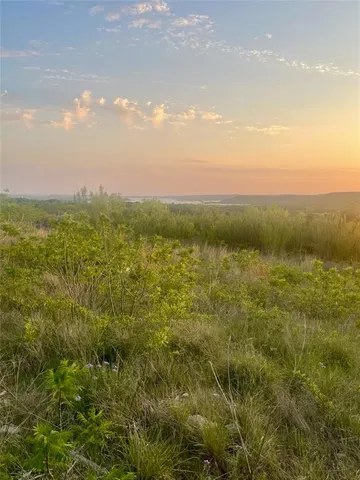 a view of a lake with a city