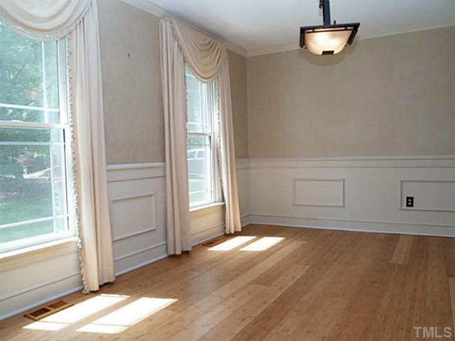 225 Carriage Trail Raleigh, NC 27614 - Photo 14 of 25 a view of an empty room with a window