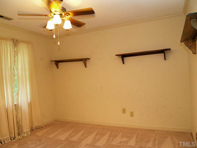 225 Carriage Trail Raleigh, NC 27614 - Photo 19 of 25 a view of a small space with a fan