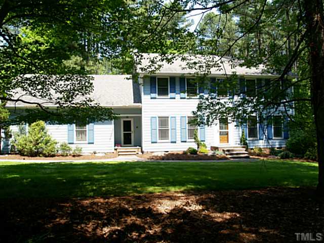 225 Carriage Trail Raleigh, NC 27614 - Photo 2 of 25 a front view of a house with a yard and garage