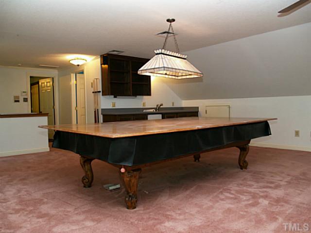 225 Carriage Trail Raleigh, NC 27614 - Photo 23 of 25 a room with a table chairs and kitchen view
