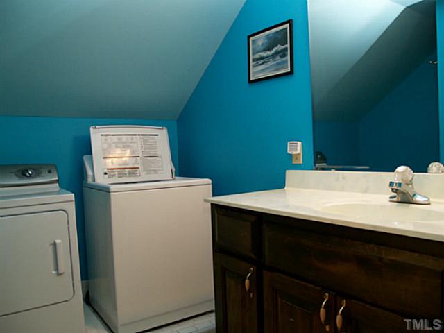 225 Carriage Trail Raleigh, NC 27614 - Photo 25 of 25 a room with a sink cabinets and utility