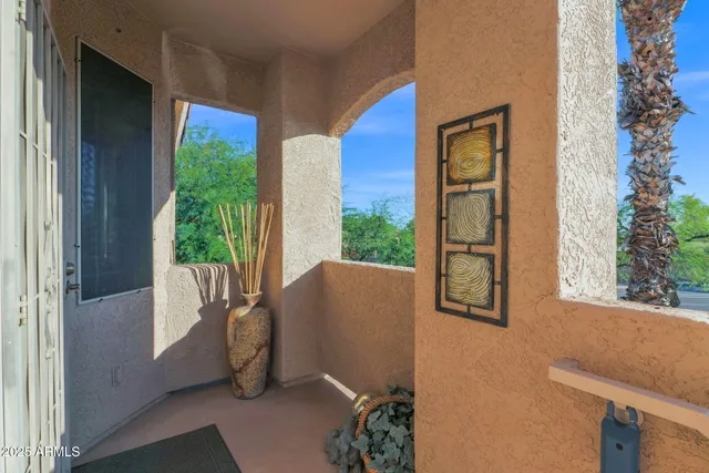 a dining room with furniture and a window