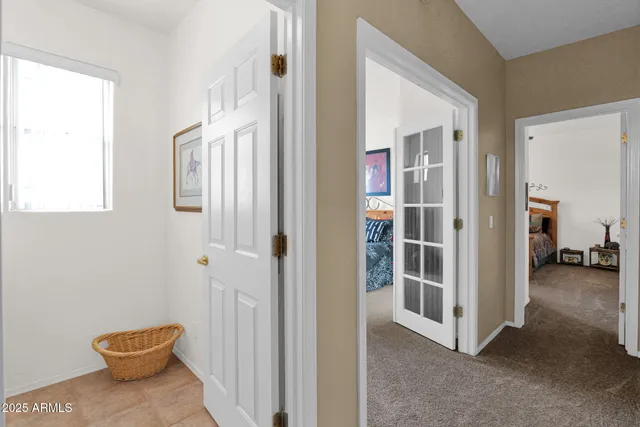 a view of a chairs and table in patio