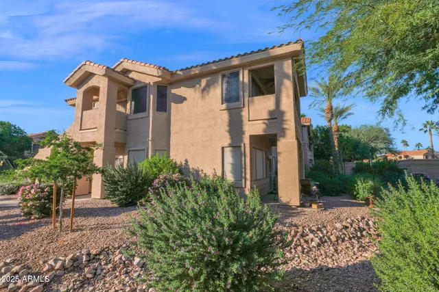 a view of balcony with furniture
