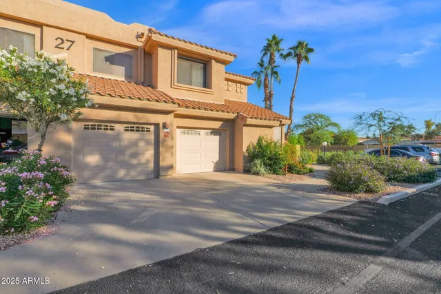 a view of a livingroom with furniture and window