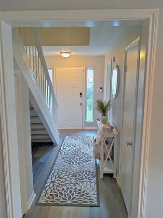 a view of a park with large trees