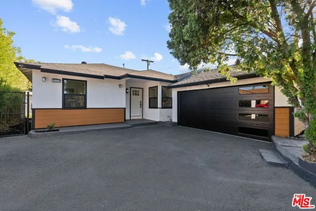 a view of a house with a garage