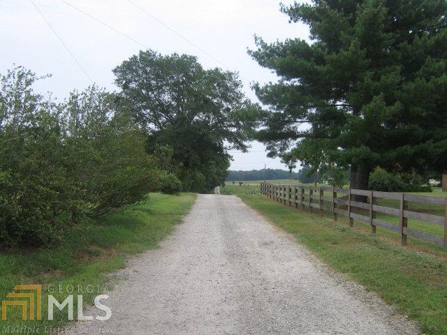 3573 Colham Ferry Road Watkinsville, GA 30677 - Photo 1 of 1 a view of park with bench and trees