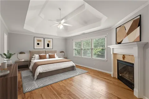 a bed room with a bed and a fireplace