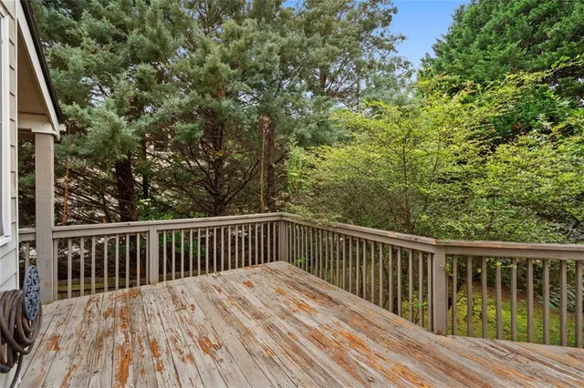 a view of balcony with wooden floor